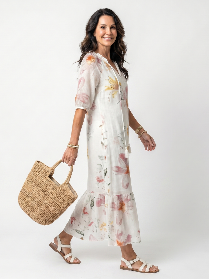 Noa white floral tiered midi dress with tassel details and a relaxed silhouette