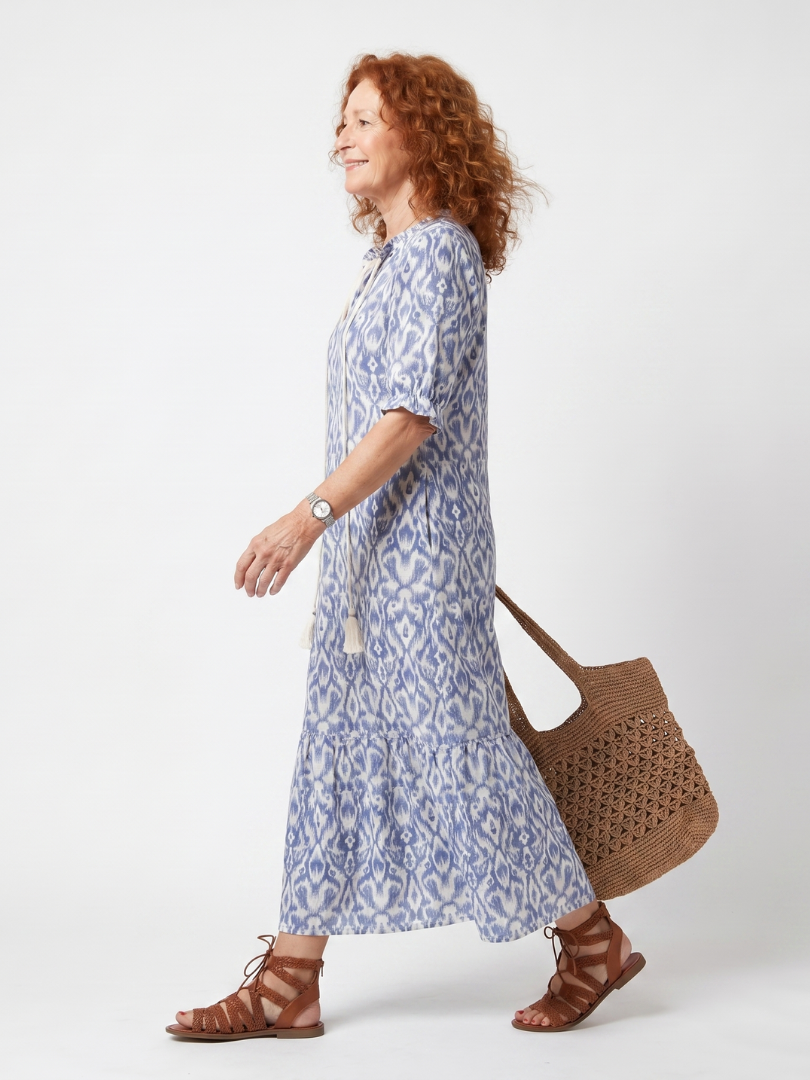 Ottoline blue printed midi dress with tassel tie neckline and relaxed silhouette
