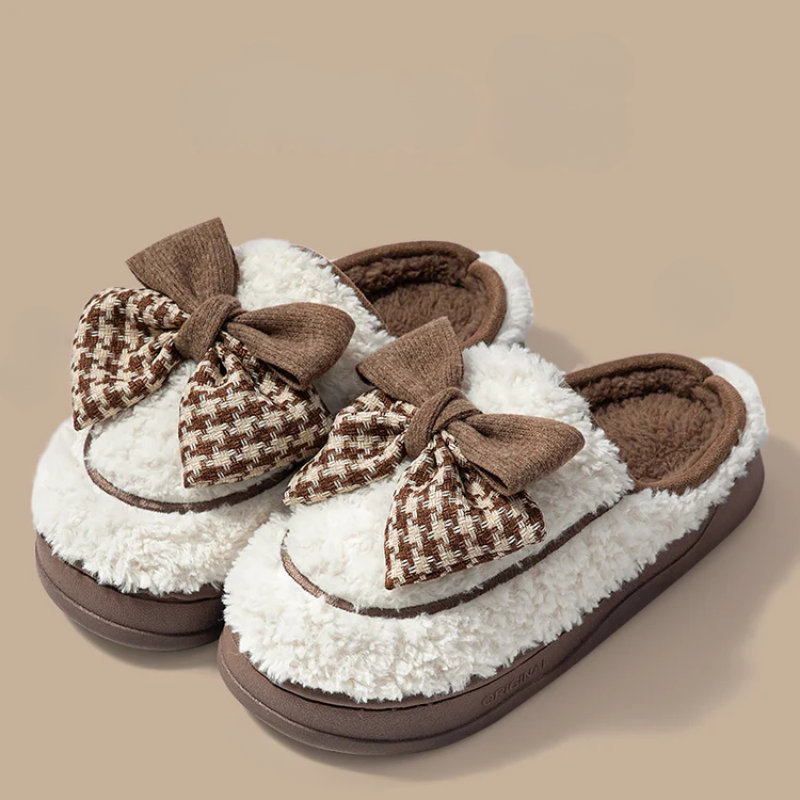 Soft teddy slippers with an oversized bow detail and non-slip sole in brown and white