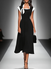 Vanessa black colorblock top with a square neckline styled for everyday wear