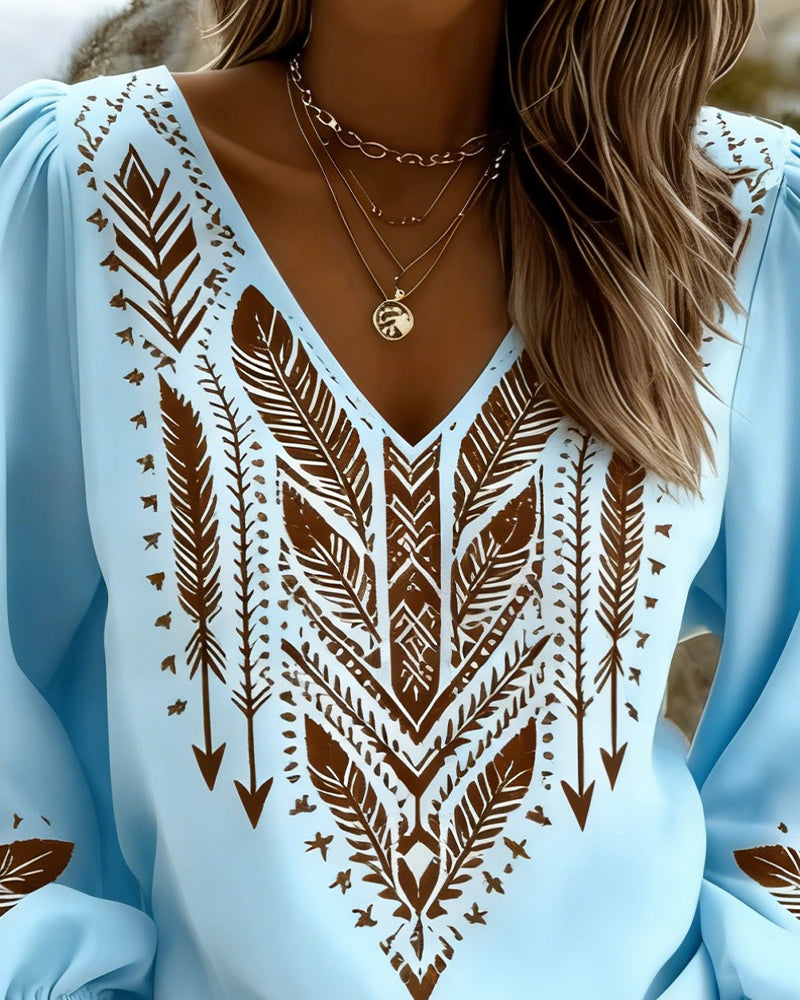Sandra puffed sleeve blouse with wide V-neck, shown in white, blue and pink