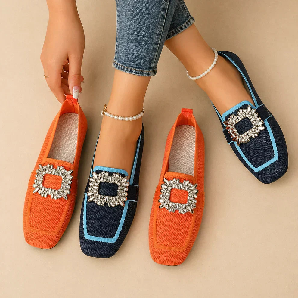 Womens buckle loafers with polished buckle detail and slip-on silhouette