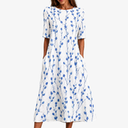 Callie blue meadow floral summer dress with deep pockets, lightweight and breezy
