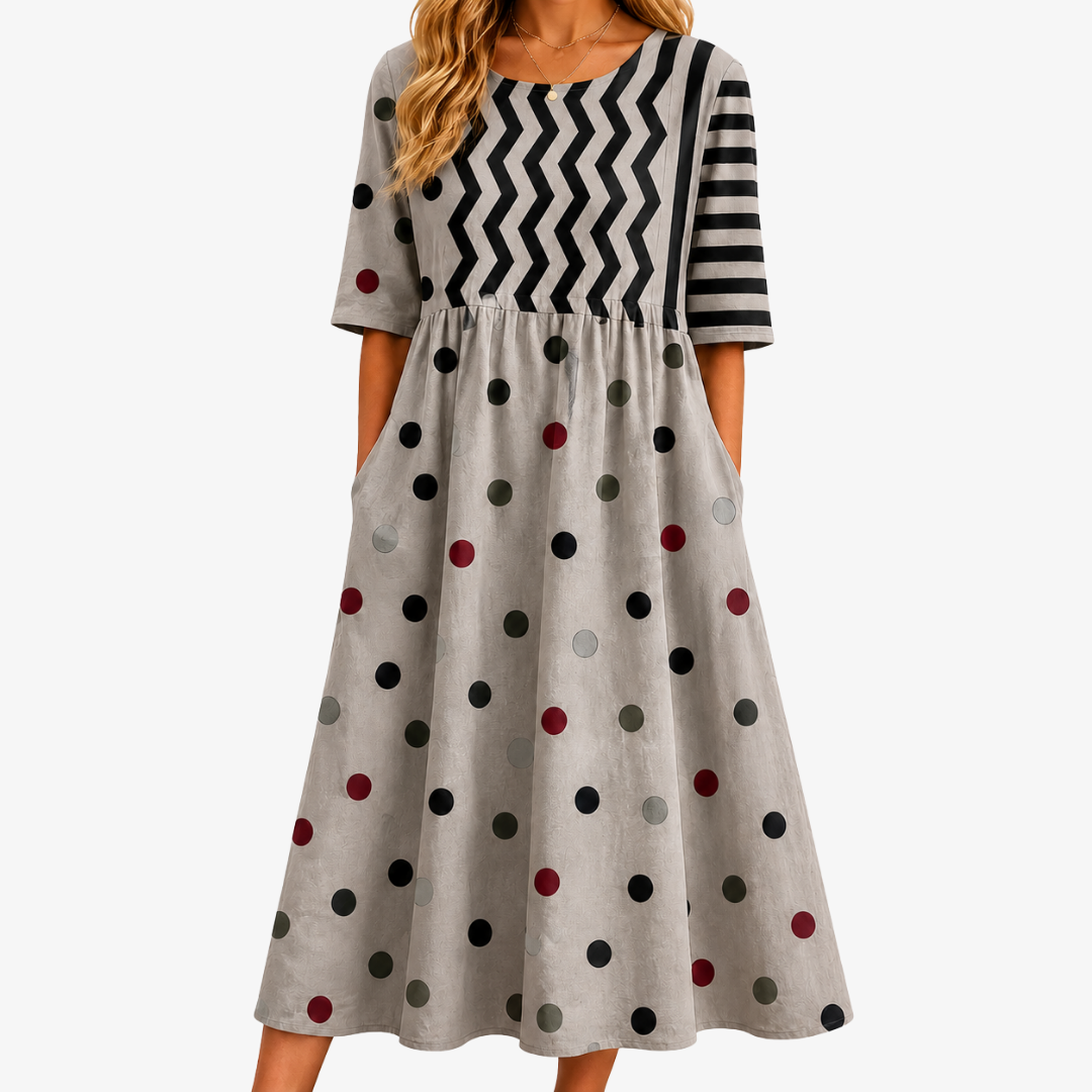 Bella lightweight summer dress in a modern mixed floral print with pockets