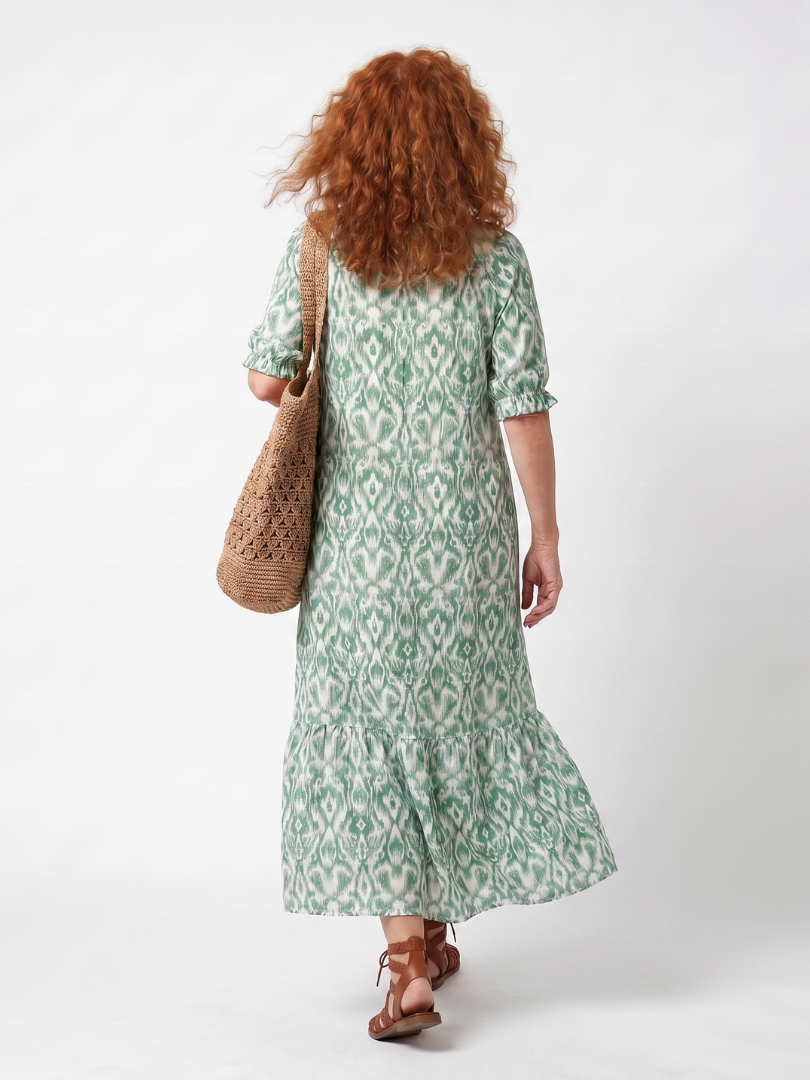 Ilara green pattern V-neck tassel midi dress with a relaxed silhouette and pockets