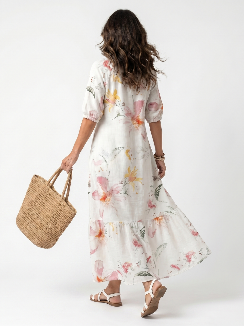 Noa white floral tiered midi dress with tassel details and a relaxed silhouette