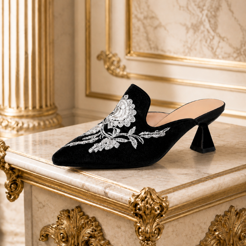Embroidered velvet pointed-toe mules with floral detail and low flared heel