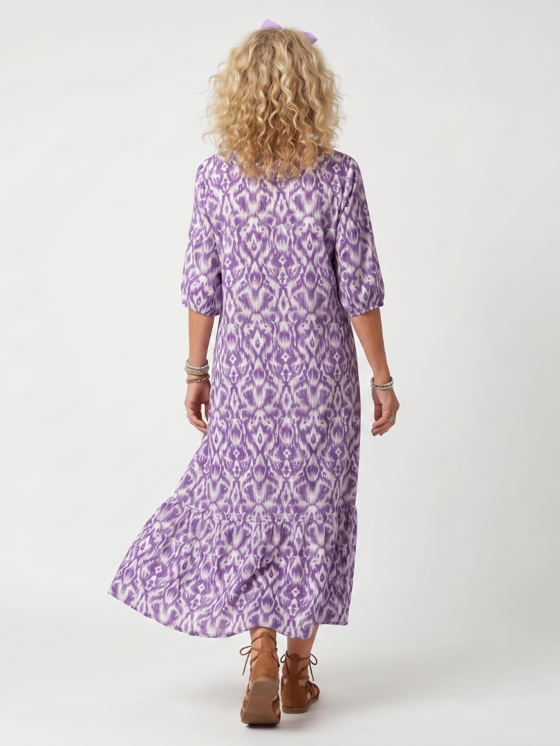 Purple printed tassel tie midi dress with a relaxed silhouette and pockets