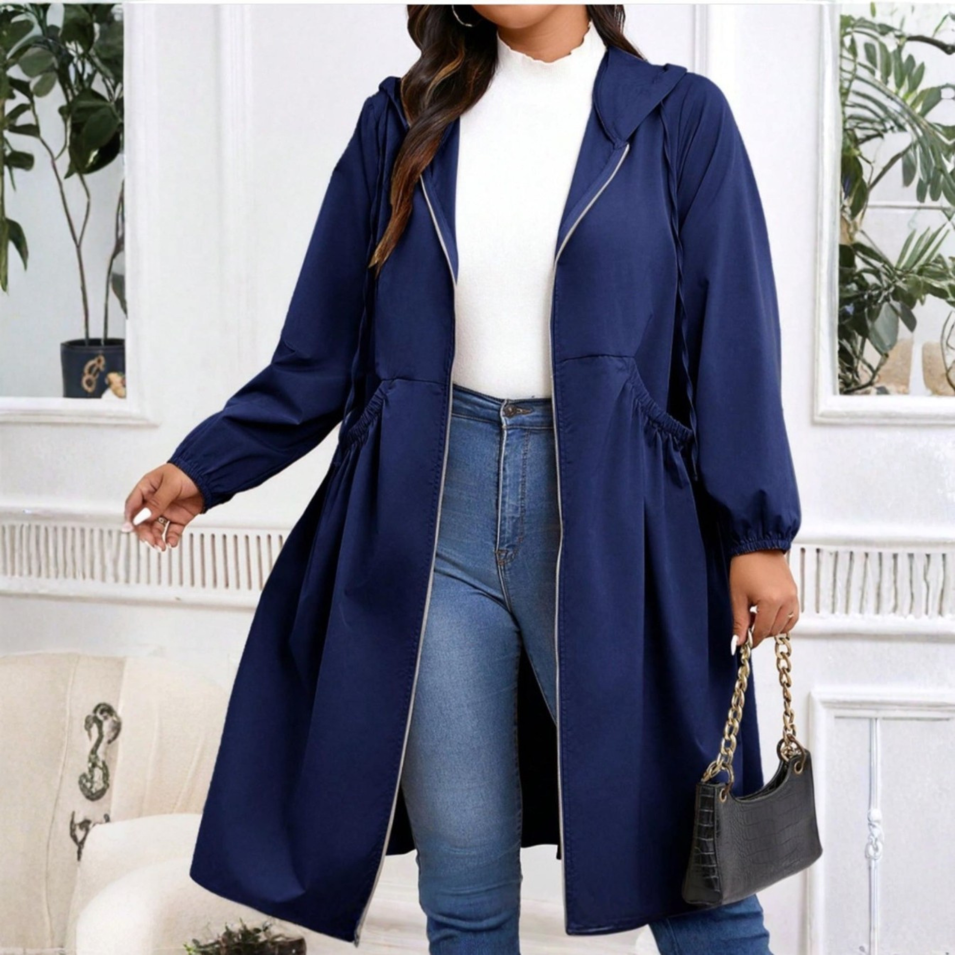 Avril zip-up hooded coat shown in black with a cosy tailored silhouette
