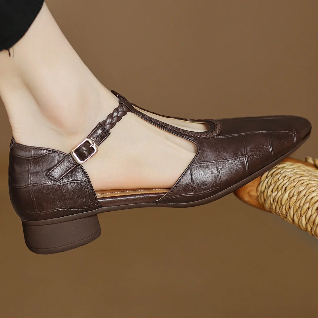 Classic Mary Jane flats shown in brown and black