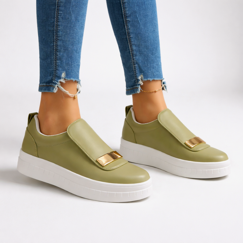 Cushioned platform slip-on shoes shown in green, white and black