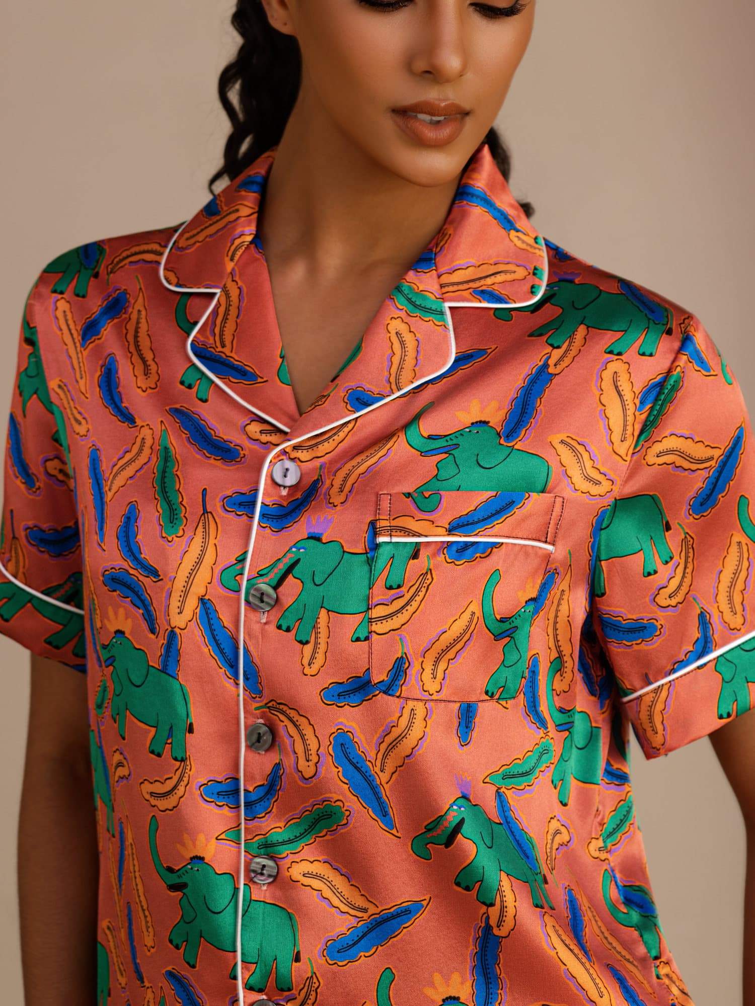 Adriana pleated pure silk pyjama set in clay elephant print, coordinated top and trousers