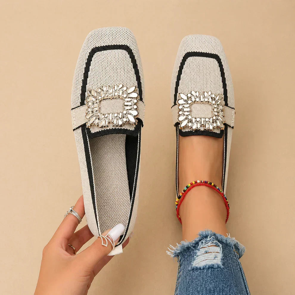 Womens buckle loafers with polished buckle detail and slip-on silhouette