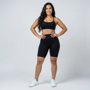 Black short sculpting legging with a flattering short cut for workouts and everyday wear