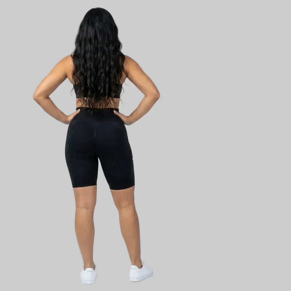 Black short sculpting legging with a flattering short cut for workouts and everyday wear