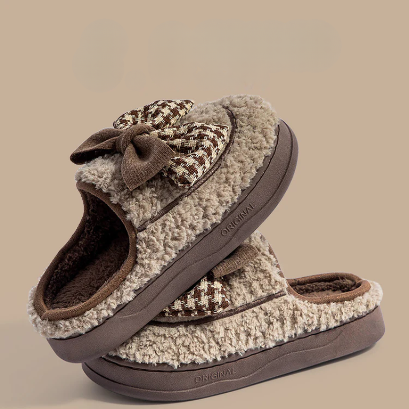 Soft teddy slippers with an oversized bow detail and non-slip sole in brown and white