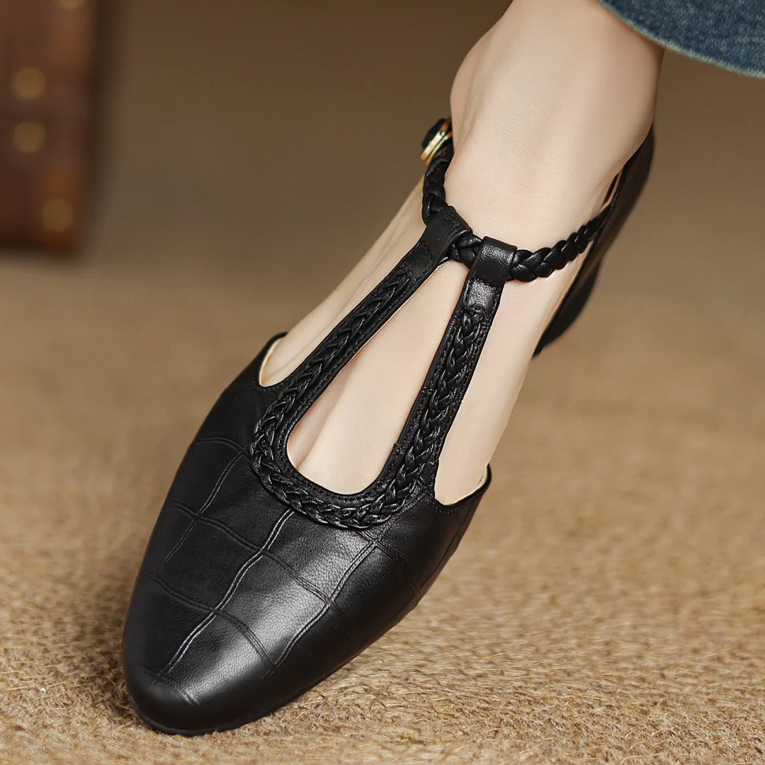Classic Mary Jane flats shown in brown and black