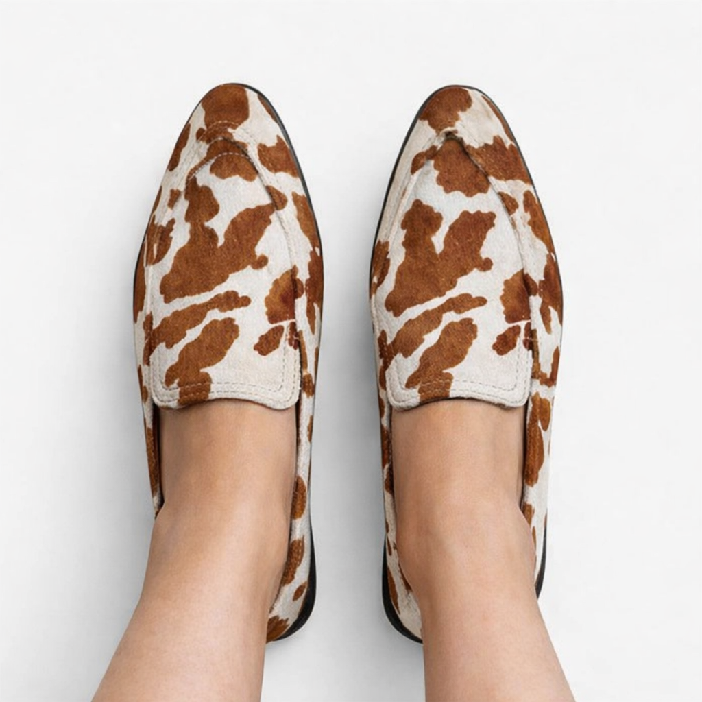 Brown classic slip-on moccasins for women with a refined, timeless silhouette