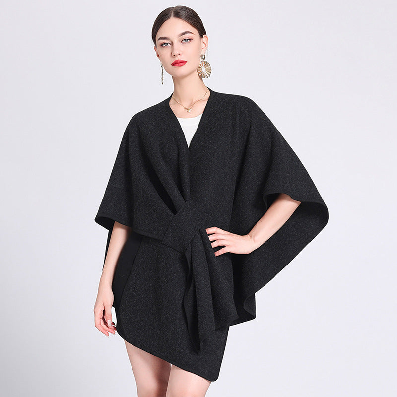 Marina caped fleece shawl draped over the shoulders in a soft neutral tone