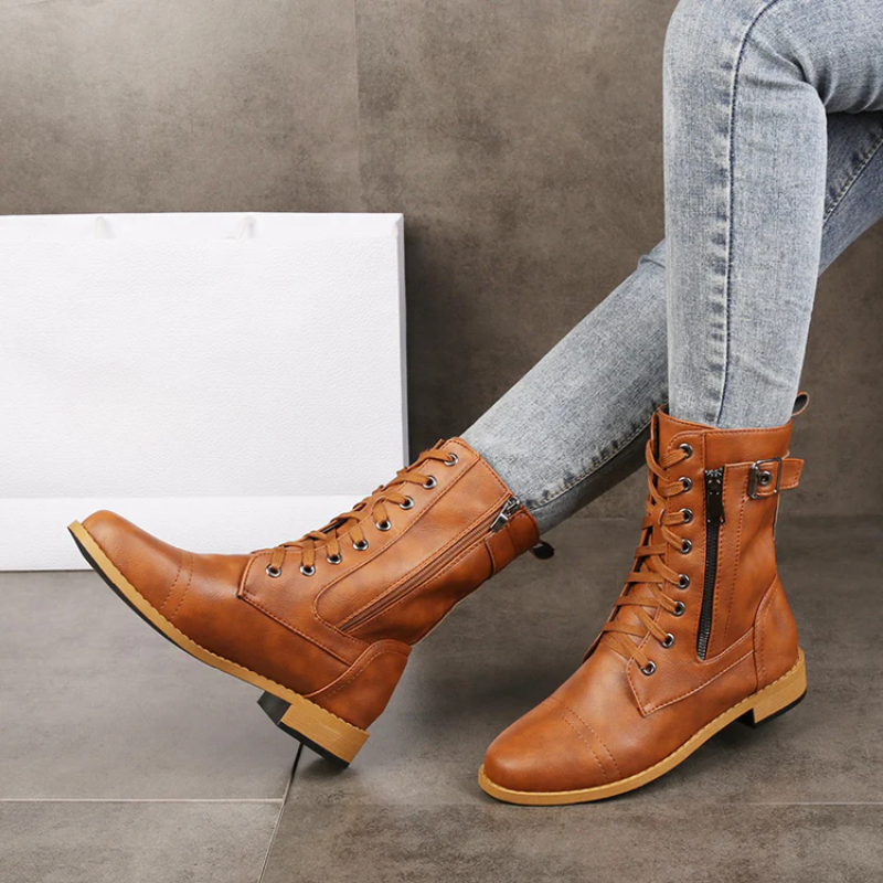 Eco-leather lace-up boots with buckle detail, side zip and a low heel