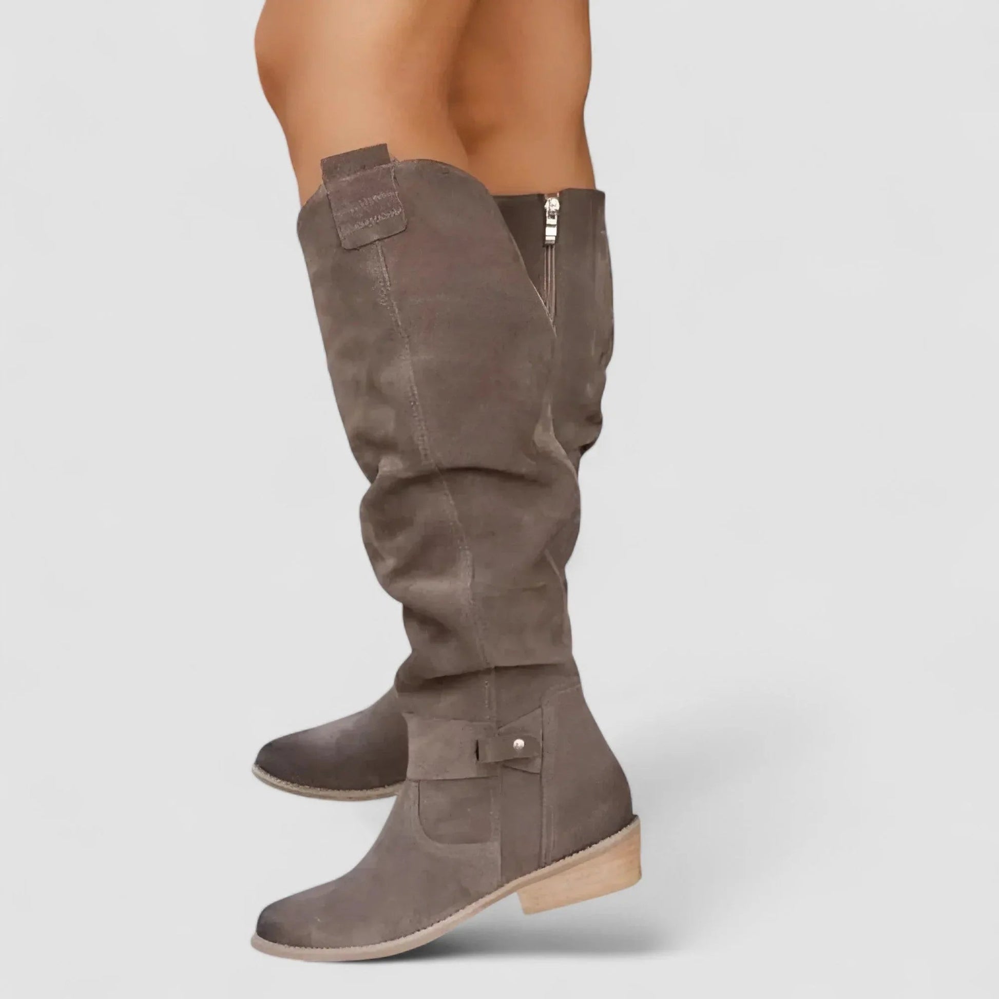 Nora orthopedic western ankle boots shown in beige, brown, dark green and black