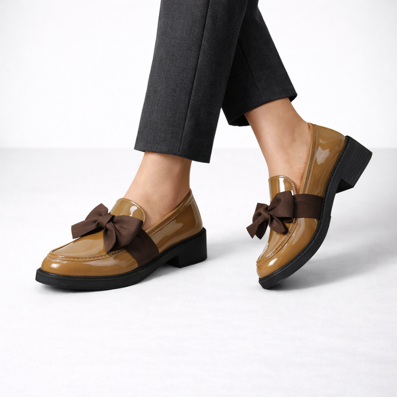 Patent leather bow-detail loafers with a low block heel and round toe