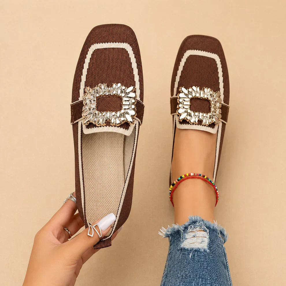 Womens buckle loafers with polished buckle detail and slip-on silhouette