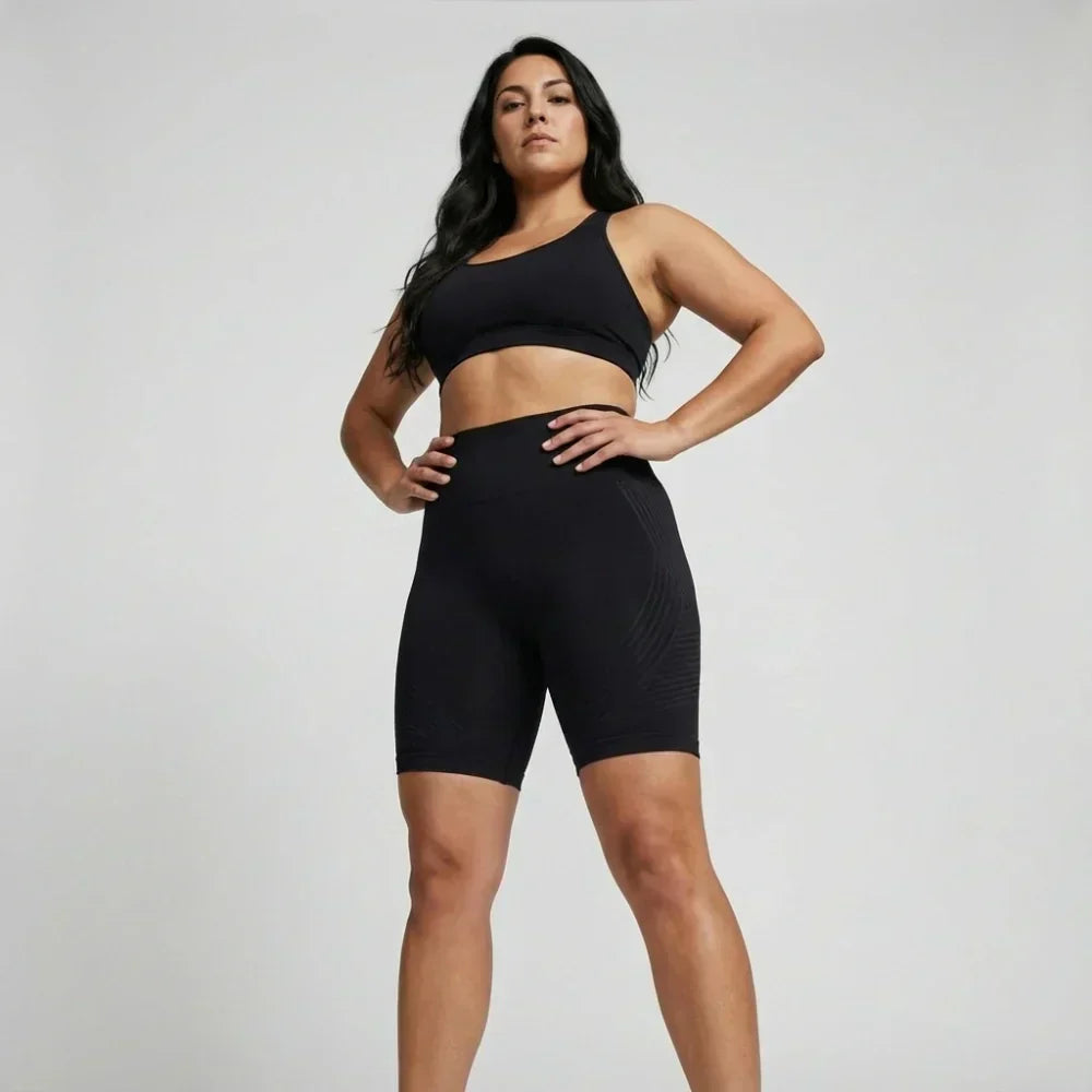 Black short sculpting legging with a flattering short cut for workouts and everyday wear