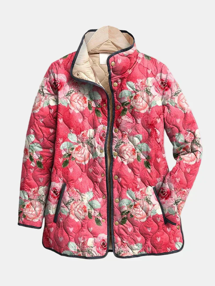 Freya lightweight quilted jacket in a charming pink floral print with a relaxed fit
