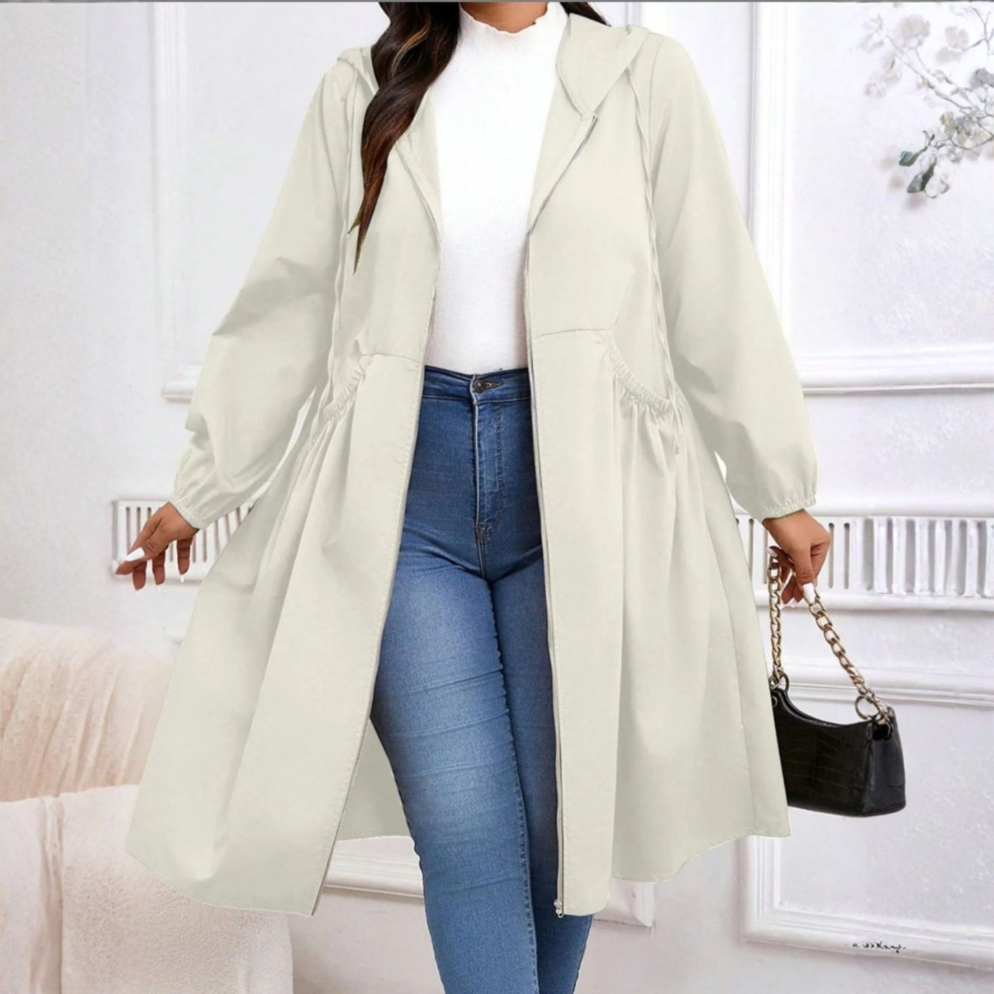 Avril zip-up hooded coat shown in black with a cosy tailored silhouette