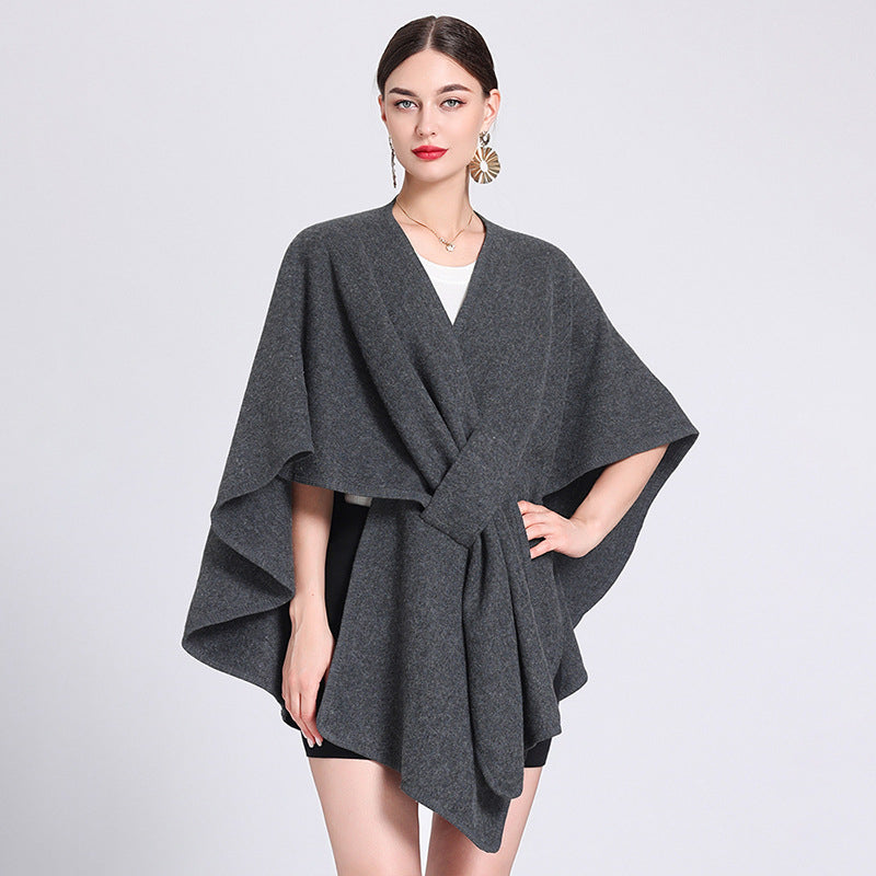 Marina caped fleece shawl draped over the shoulders in a soft neutral tone
