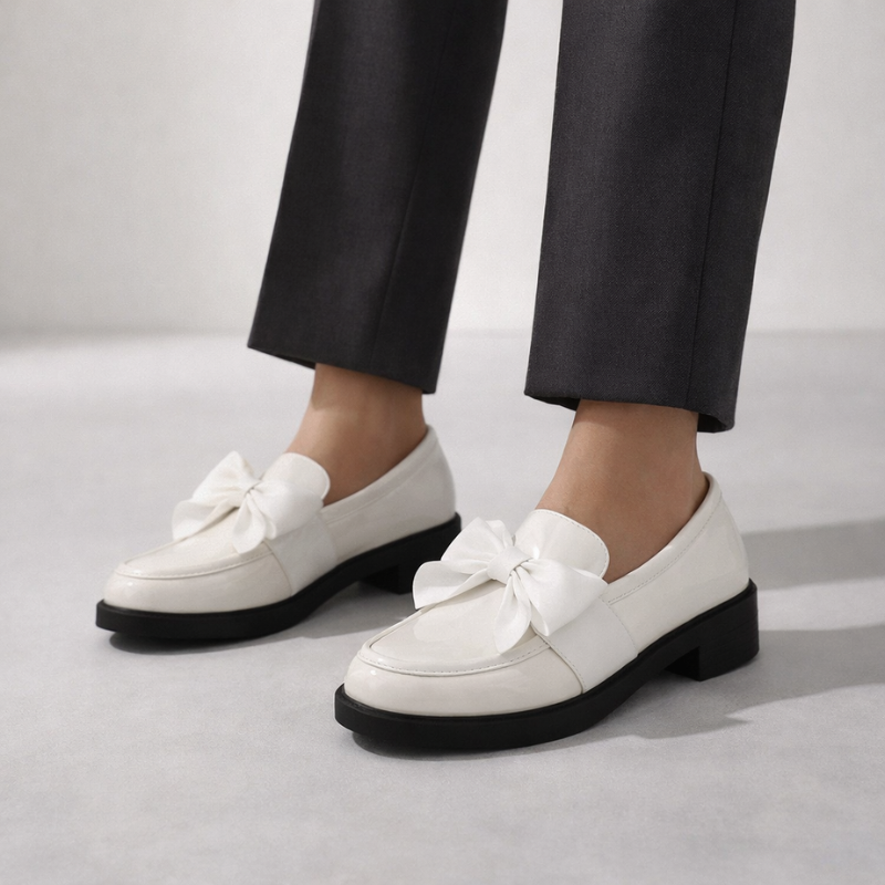 Patent leather bow-detail loafers with a low block heel and round toe