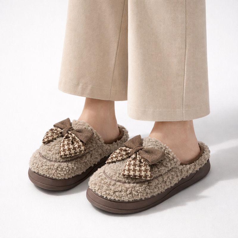 Soft teddy slippers with an oversized bow detail and non-slip sole in brown and white