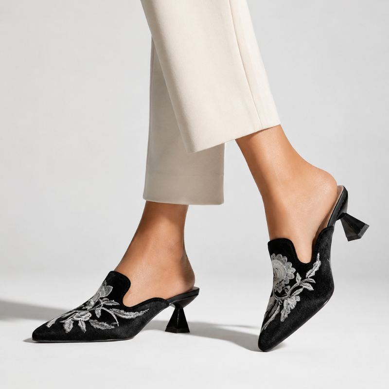 Embroidered velvet pointed-toe mules with floral detail and low flared heel
