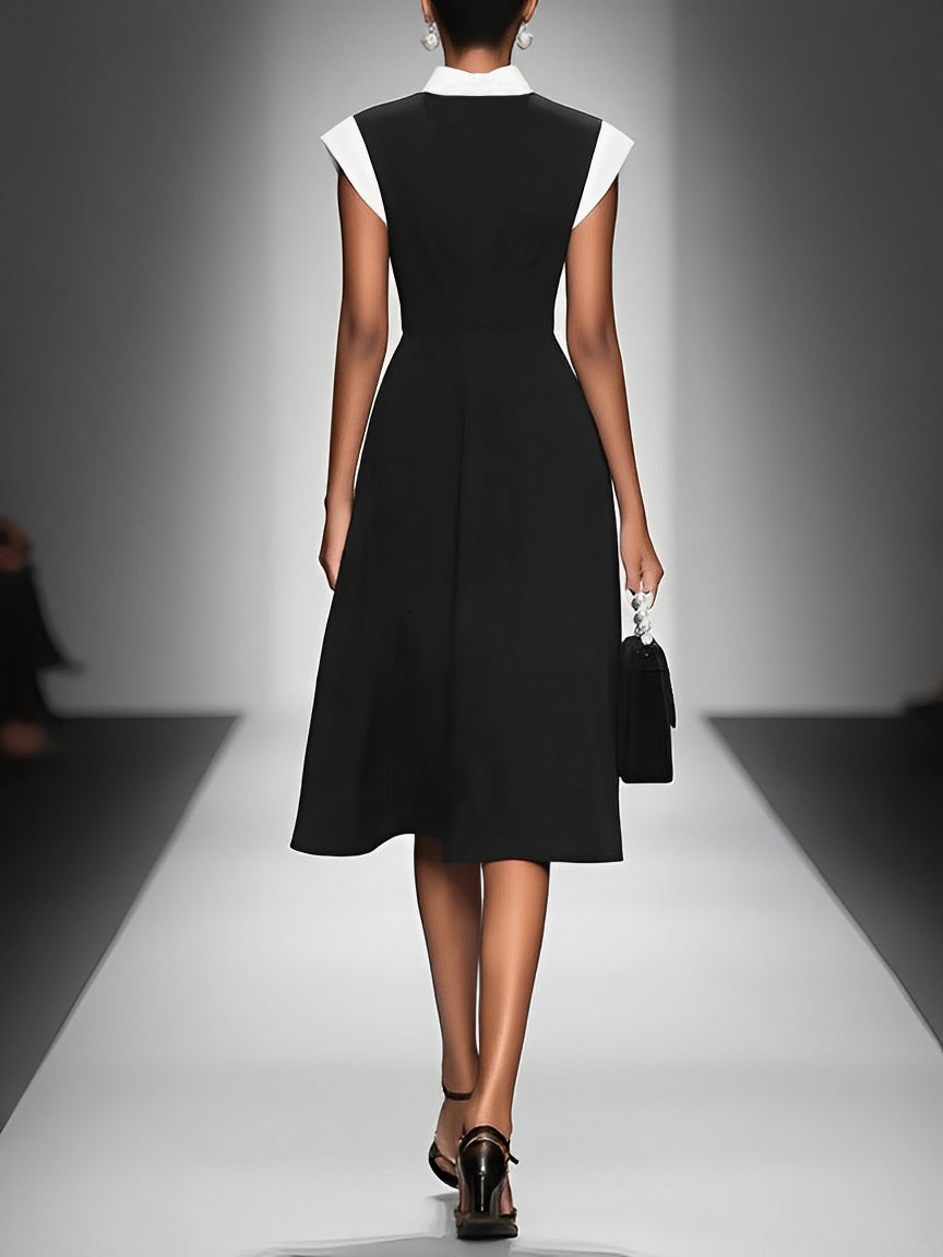 Vanessa black colorblock top with a square neckline styled for everyday wear