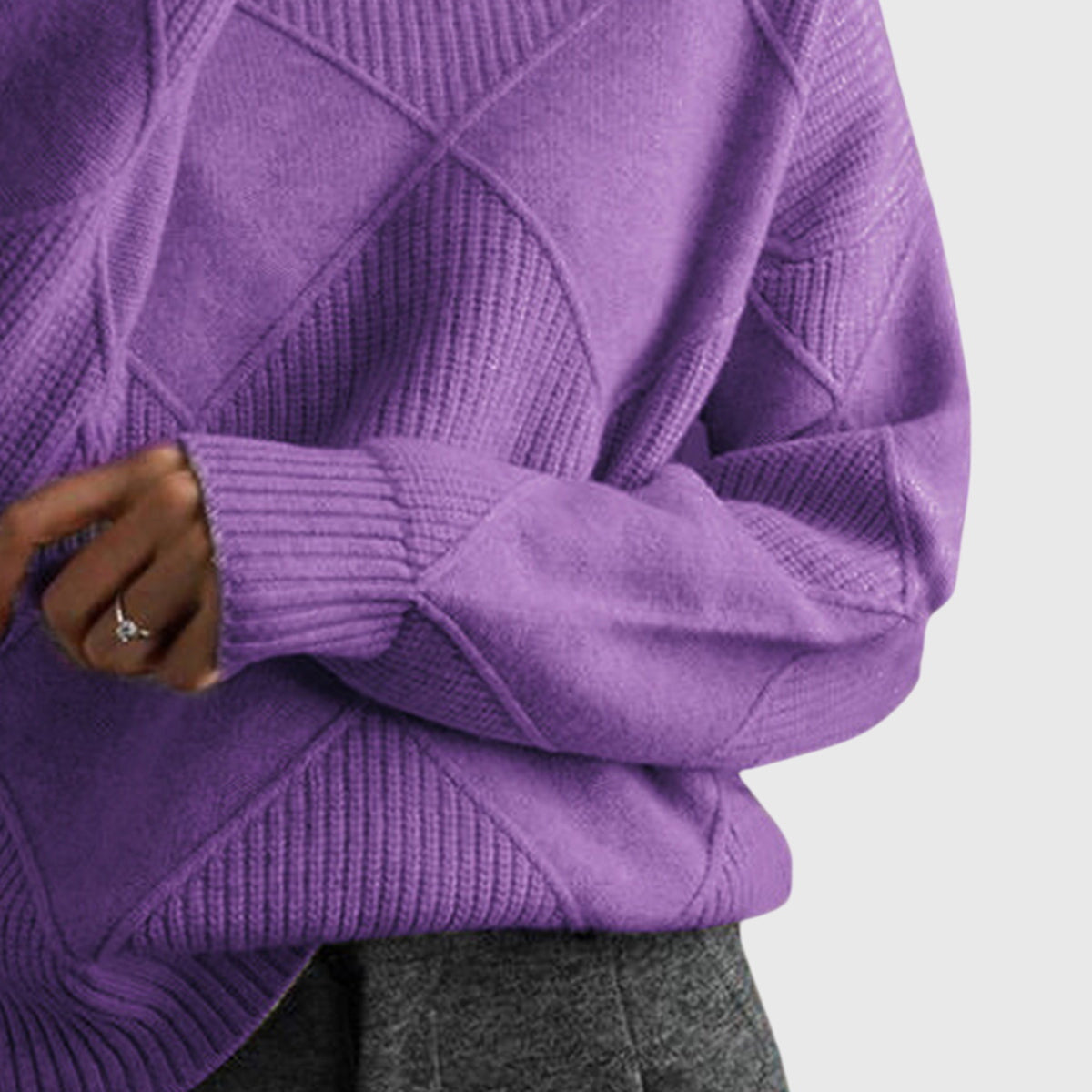 Angela relaxed-fit turtleneck jumper with subtle geometric knit pattern and ribbed cuffs