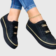 Camille slip-on everyday sneakers shown in black, white and gold