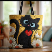 Artisanal handmade bag featuring a black cat and daisy design, shown in two sizes