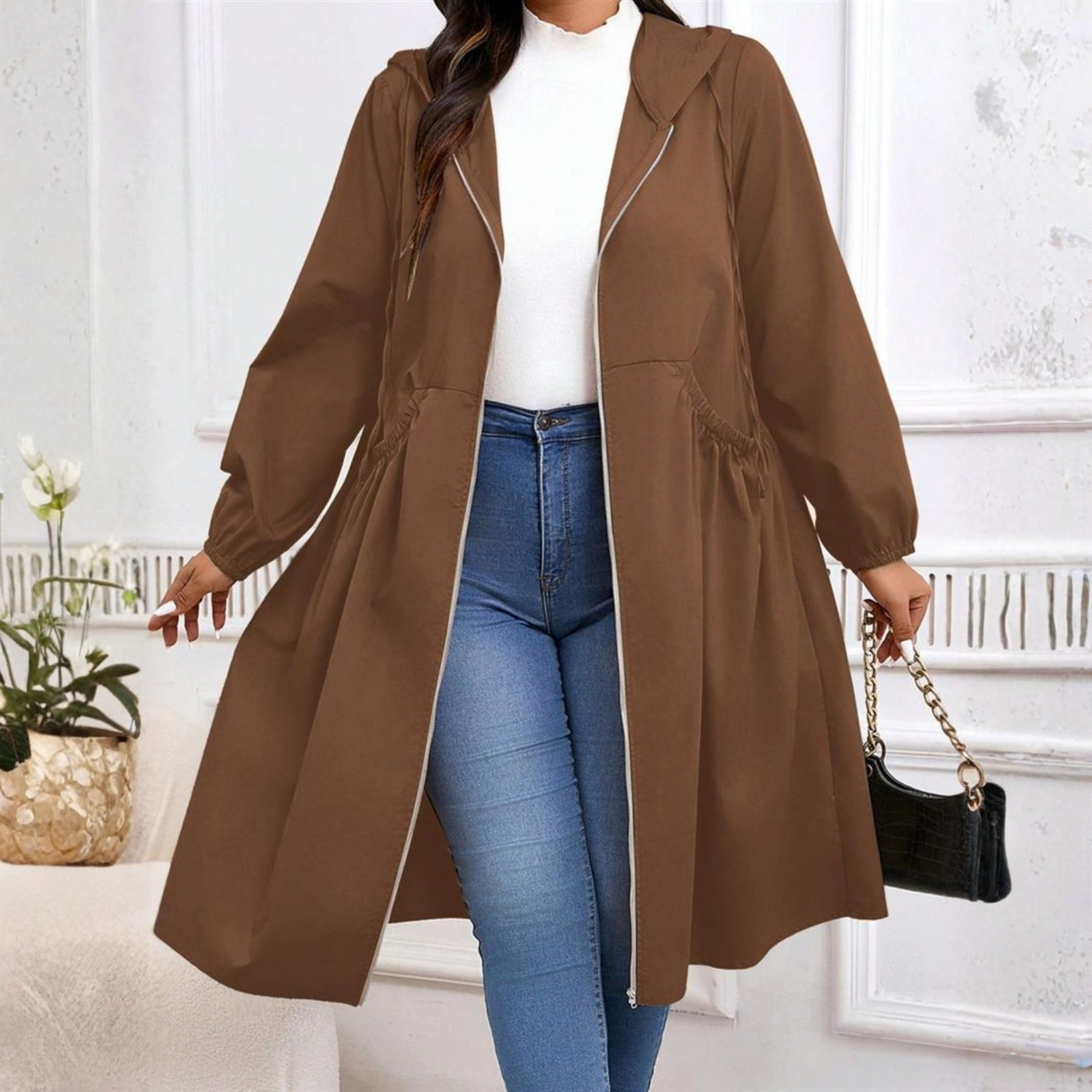 Avril zip-up hooded coat shown in black with a cosy tailored silhouette