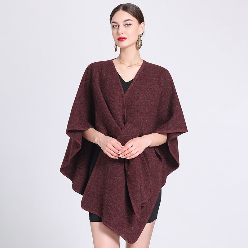 Marina caped fleece shawl draped over the shoulders in a soft neutral tone