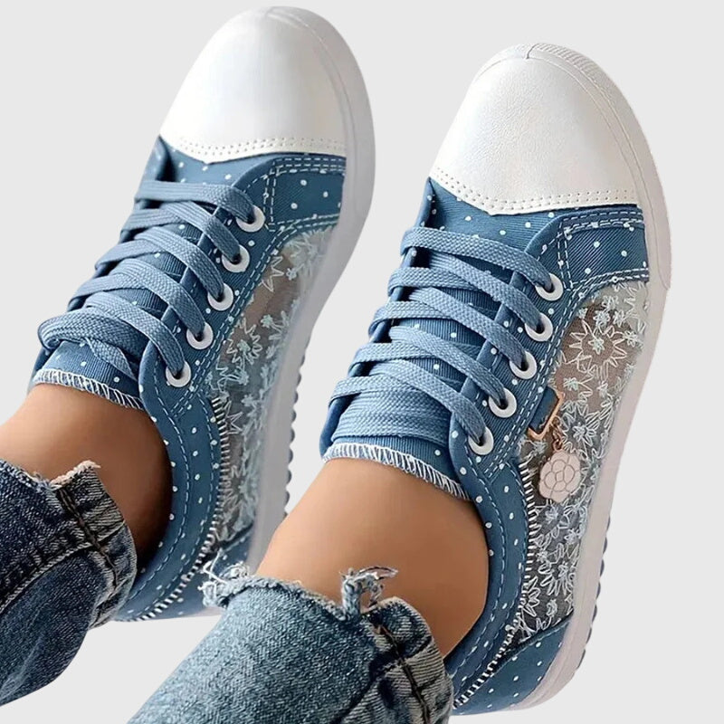 Comfortable lace-up sneakers in soft blue tones for everyday wear