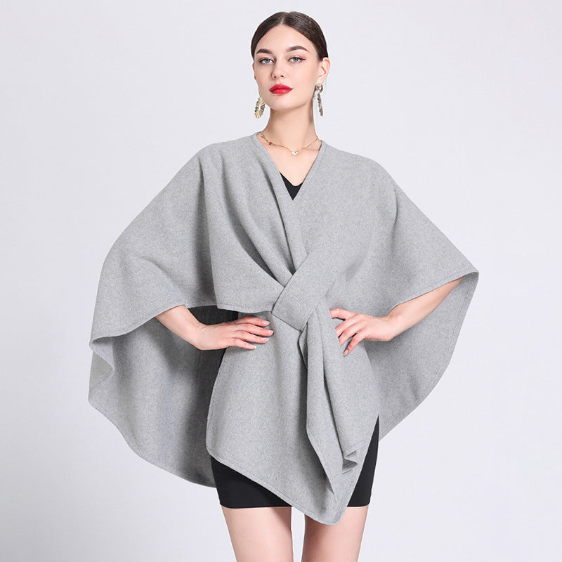 Marina caped fleece shawl draped over the shoulders in a soft neutral tone