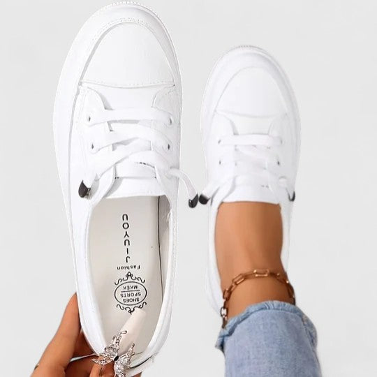 Comfortable slip-on everyday shoes shown in white, black and beige