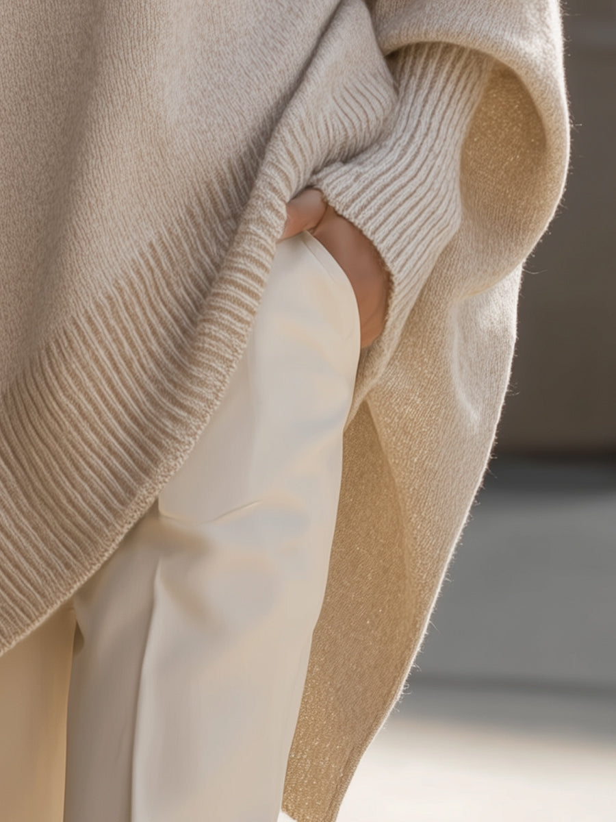 Elodie oversized wool-blend jumper with dropped shoulders, ribbed cuffs and asymmetric hem