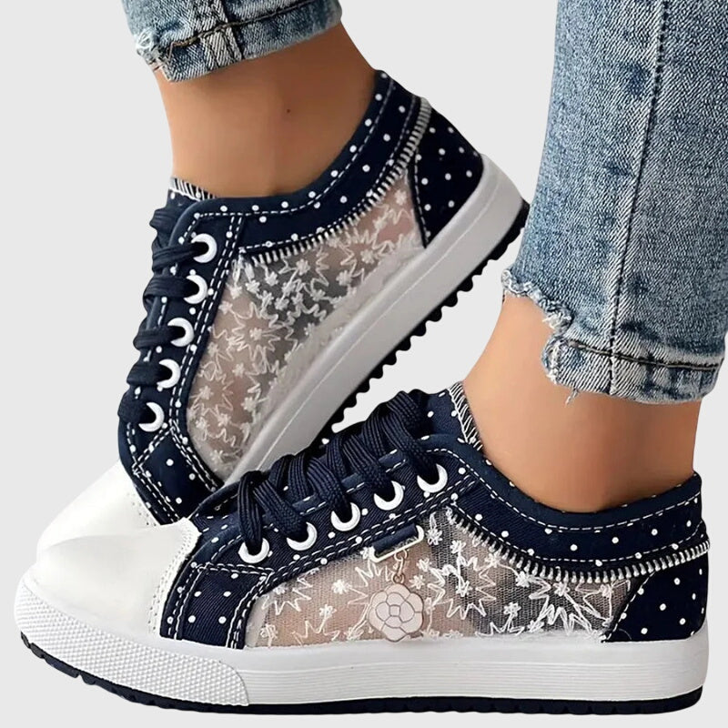 Comfortable lace-up sneakers in soft blue tones for everyday wear