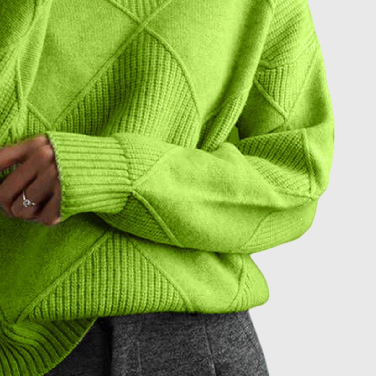 Angela relaxed-fit turtleneck jumper with subtle geometric knit pattern and ribbed cuffs