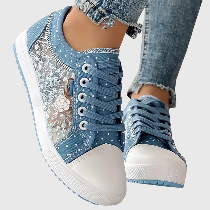 Comfortable lace-up sneakers in soft blue tones for everyday wear