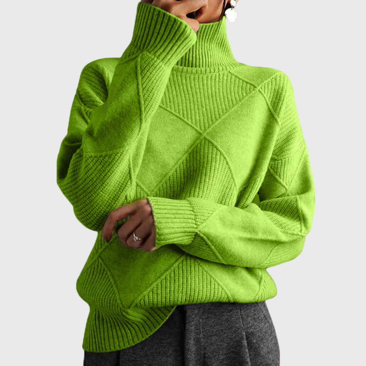 Angela relaxed-fit turtleneck jumper with subtle geometric knit pattern and ribbed cuffs