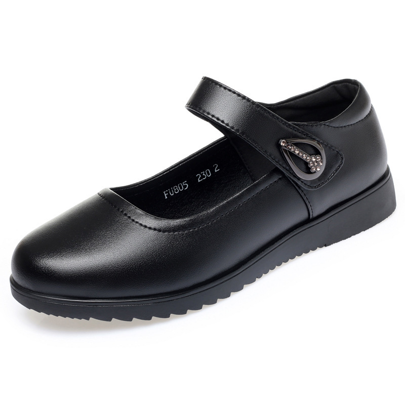 Black comfortable slip-on shoes for women, styled for everyday wear