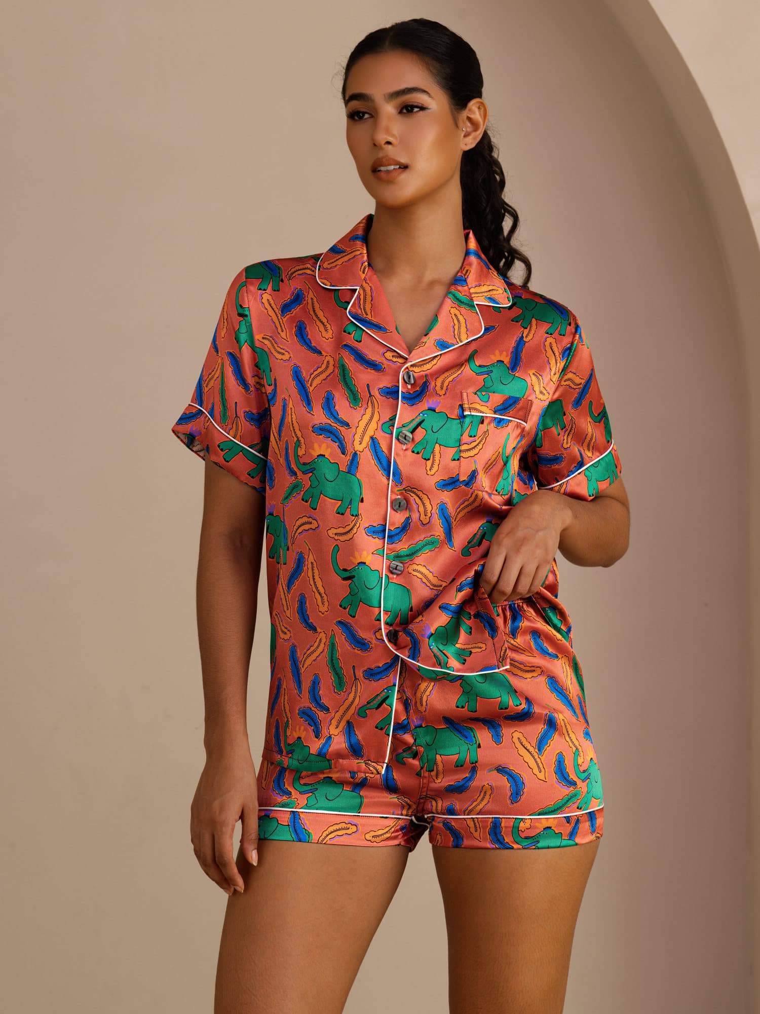 Adriana pleated pure silk pyjama set in clay elephant print, coordinated top and trousers